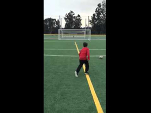 9 year old Dman calling out where he is gonna place the ball off of free kick outside of the 18 yar 