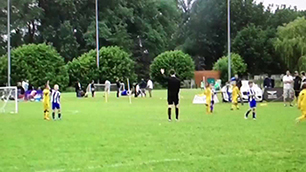 8 year old hits a Beckham like free kick in final.