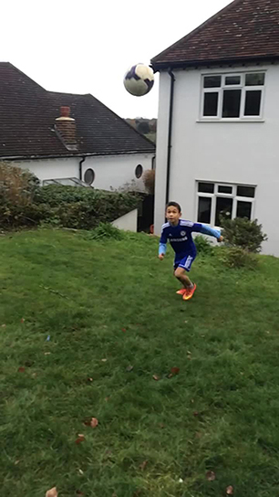 Charlie doing a Rabona chip and shoot 